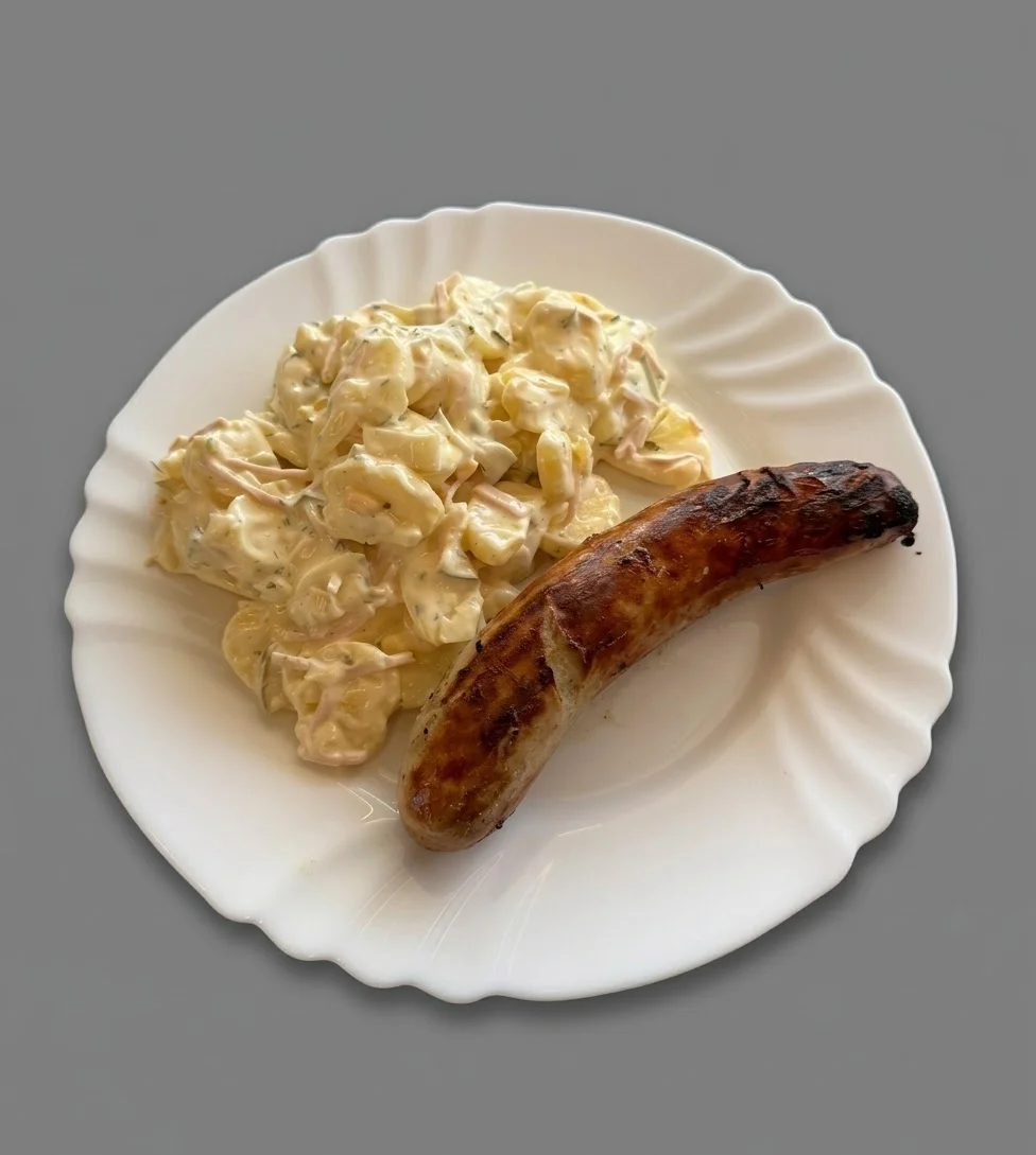 Roster mit Kartoffelsalat