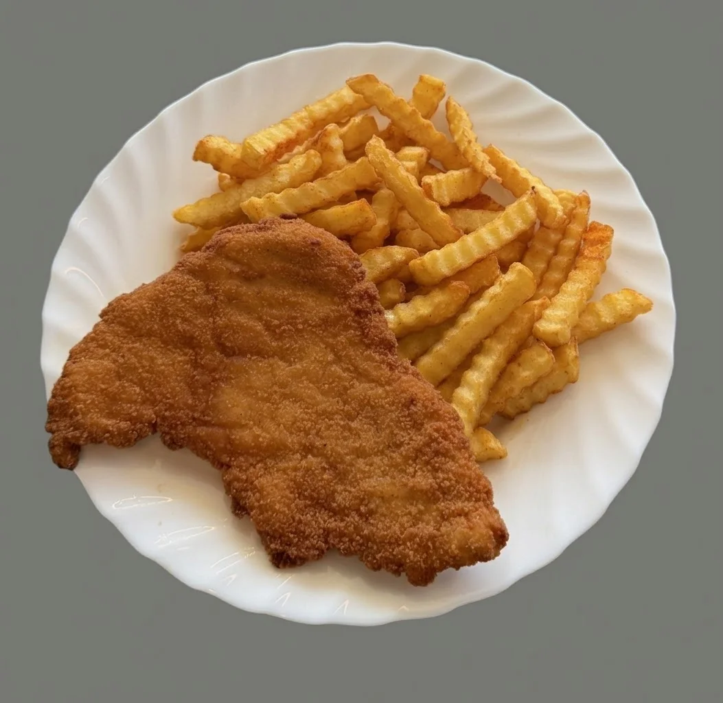 Putenschnitzel mit Pommes
